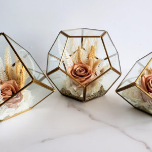 Trio of geometric vases with dried flowers